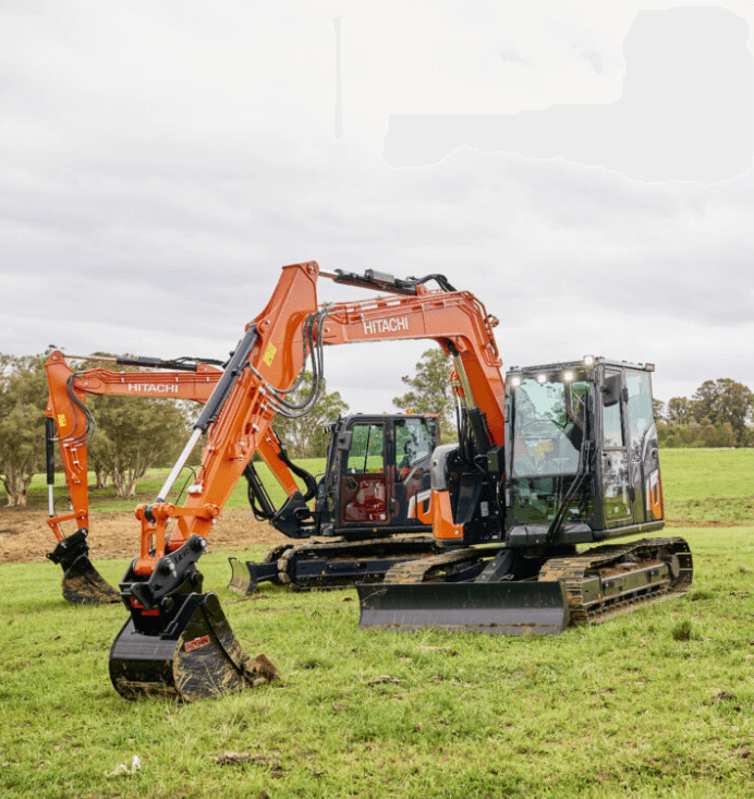 Two Hitachi compact excavators